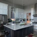 Modern kitchen with custom cabinetry, large island, stainless steel appliances, and pendant lighting, showcasing The Perfect Cabinet's remodeling services.