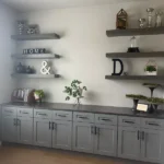 Modern office cabinetry with gray lower cabinets, open shelving displaying decorative items, and a plant, highlighting The Perfect Cabinet's design capabilities.