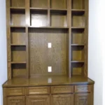 Custom wooden cabinetry with open shelves and lower storage drawers, showcasing design options for office remodeling by The Perfect Cabinet.